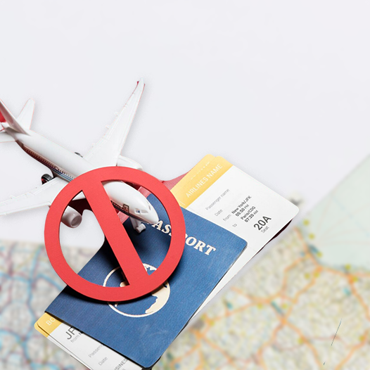 Travel ban concept with passport and ticket, highlighting expert help from immigration consultants in Kerala